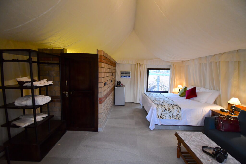 Cozy tent interior with modern furnishings.